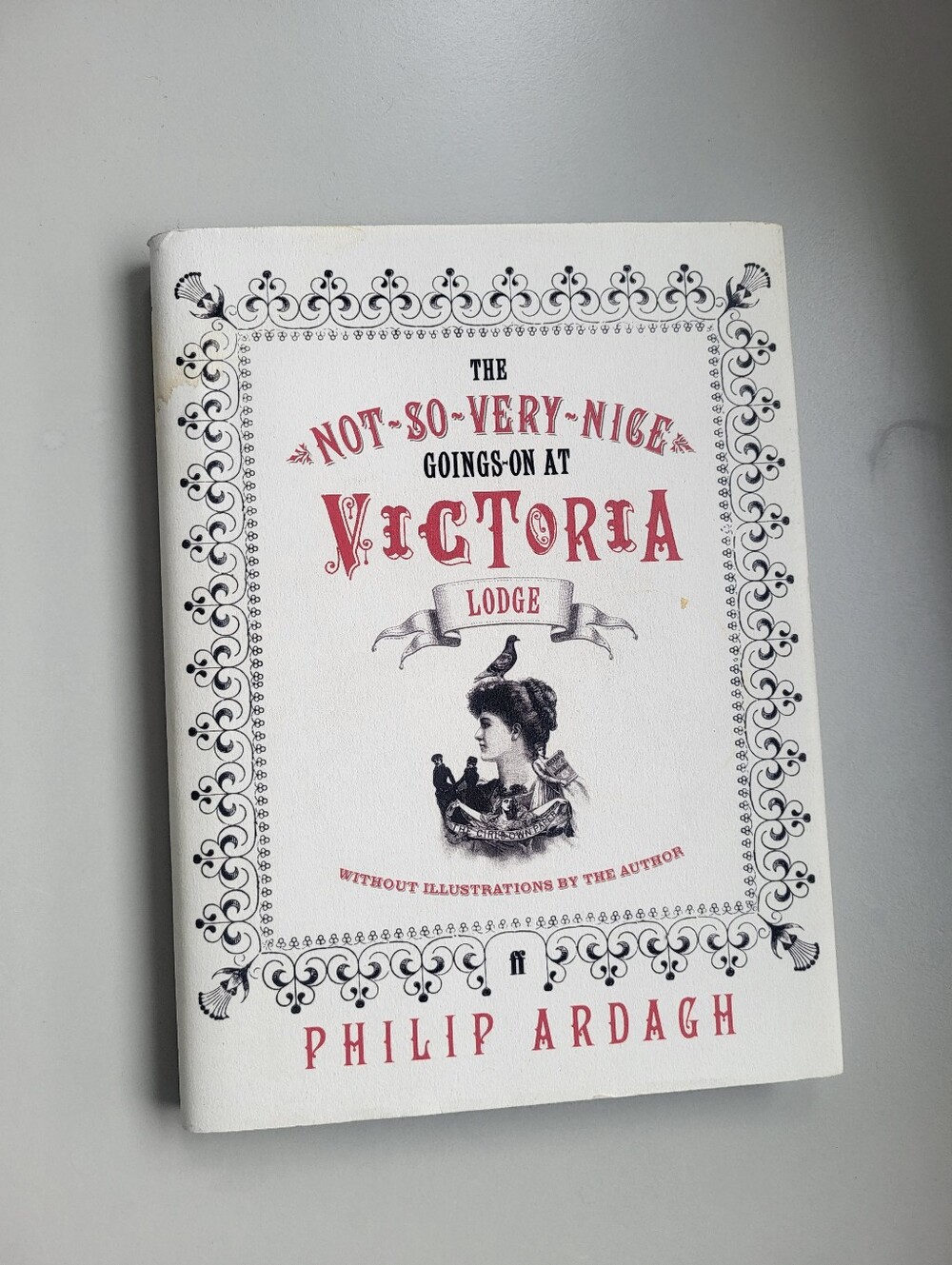The Not-So-Very-Nice Goings-On at Victoria Lodge Paperback - White & Red Cover